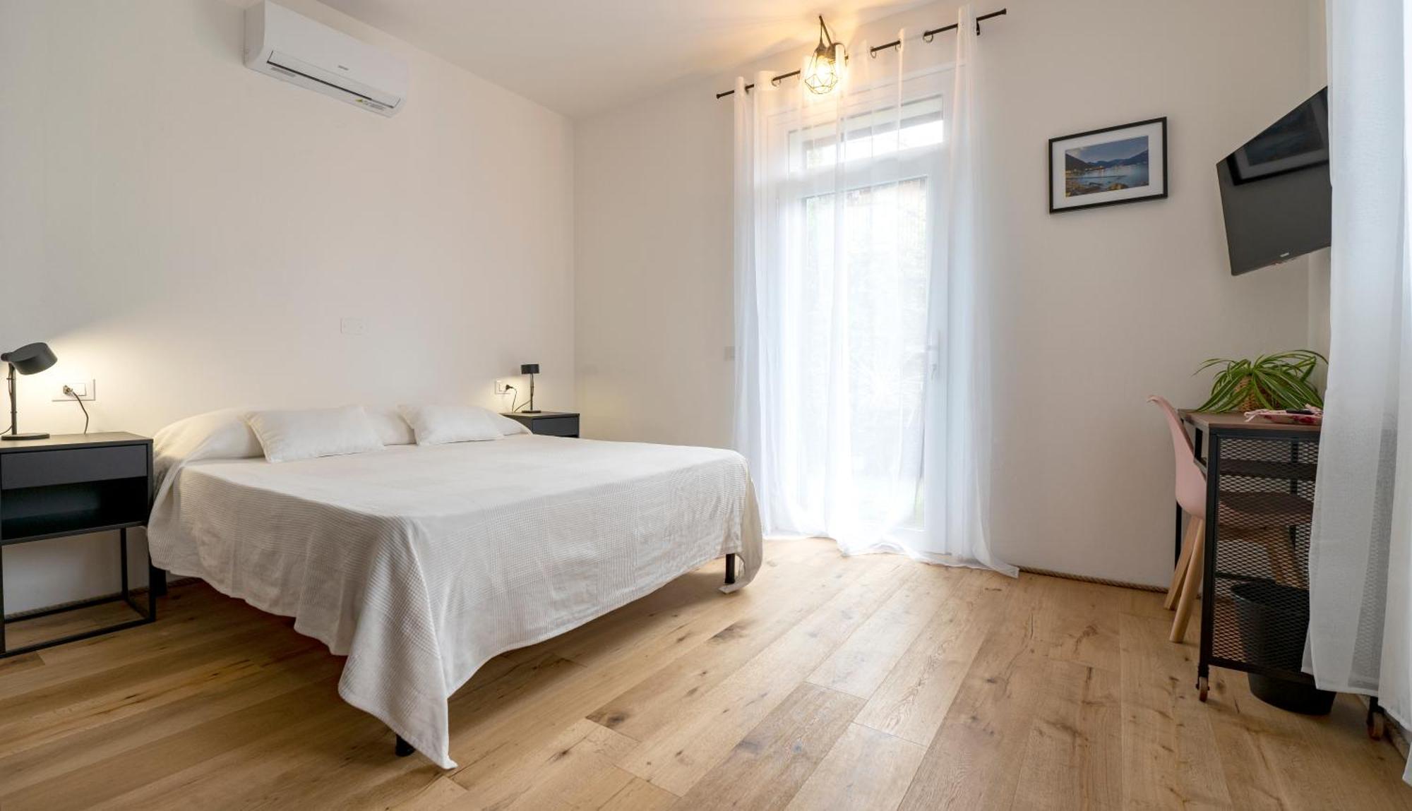 Salice Divino Lezzeno Quarto foto